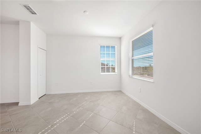 view of tiled empty room