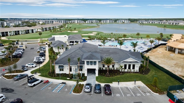 drone / aerial view with a water view