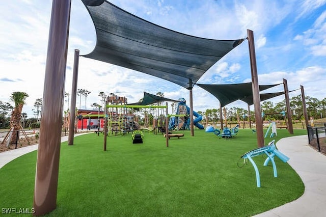 view of play area with a yard