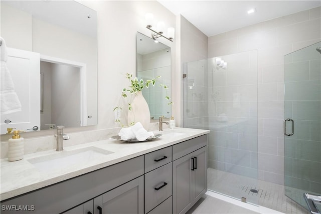 bathroom with vanity and walk in shower