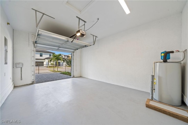 garage with electric panel, a garage door opener, and water heater