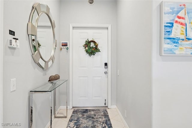 view of tiled entrance foyer