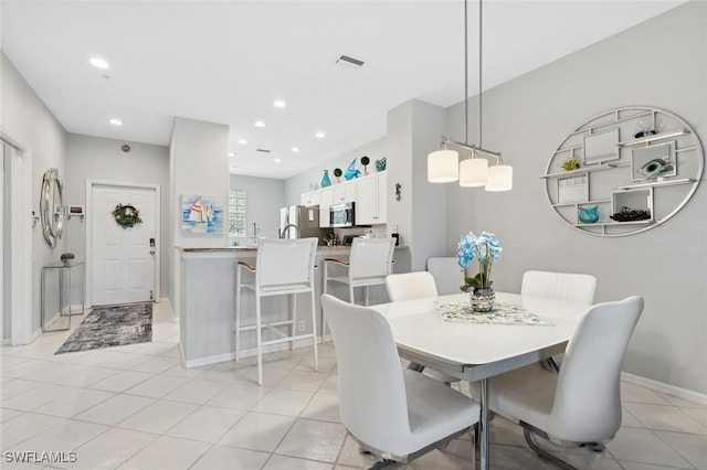 view of tiled dining room