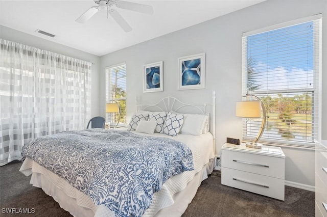 carpeted bedroom with ceiling fan