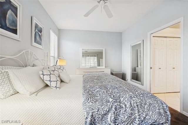 bedroom featuring ceiling fan and a closet