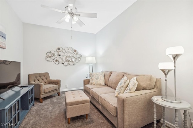 carpeted living room featuring ceiling fan and lofted ceiling