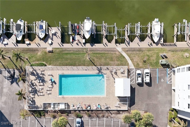 birds eye view of property featuring a water view