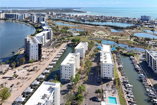 bird's eye view with a water view