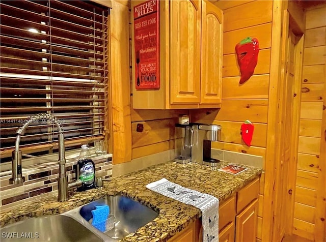 kitchen featuring backsplash and stone countertops