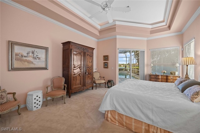 bedroom featuring light carpet, access to outside, a raised ceiling, ceiling fan, and crown molding