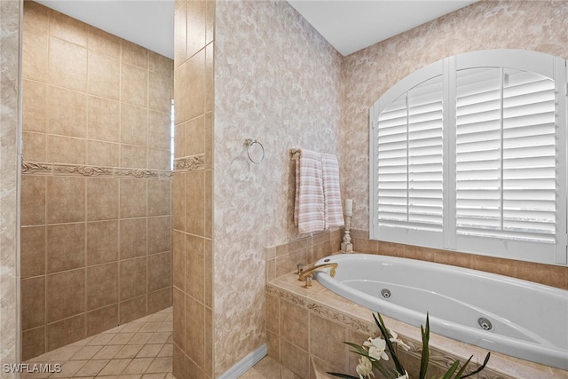 bathroom with tiled bath