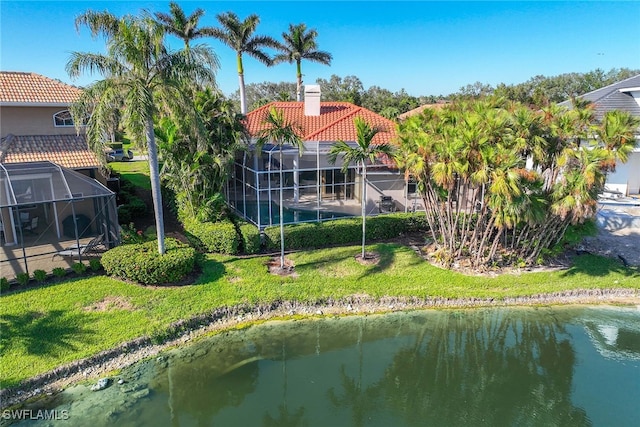 drone / aerial view featuring a water view