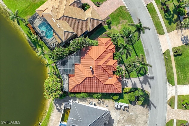 drone / aerial view featuring a water view