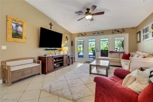 living room featuring french doors, ceiling fan, vaulted ceiling, and light tile patterned floors