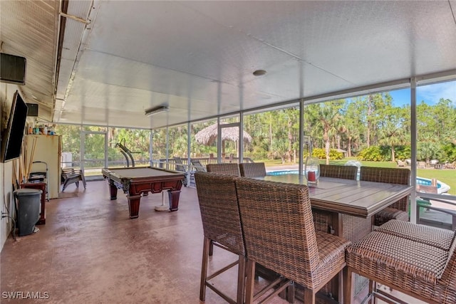 sunroom featuring billiards