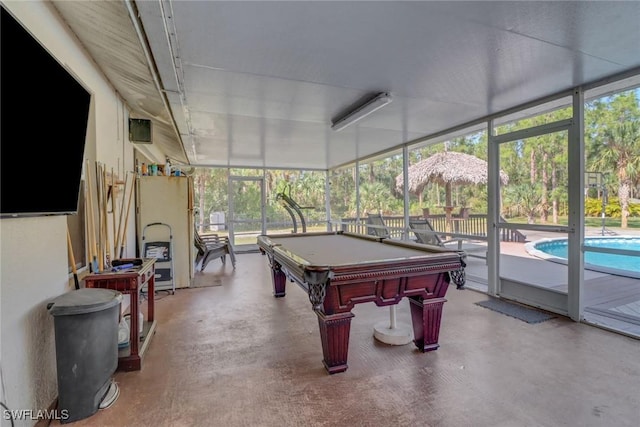 recreation room featuring concrete floors