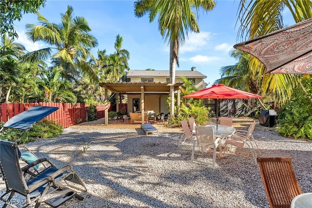 back of house with a patio area