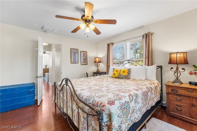 bedroom with ceiling fan and dark hardwood / wood-style flooring