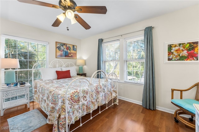 bedroom featuring ceiling fan and wood-type flooring