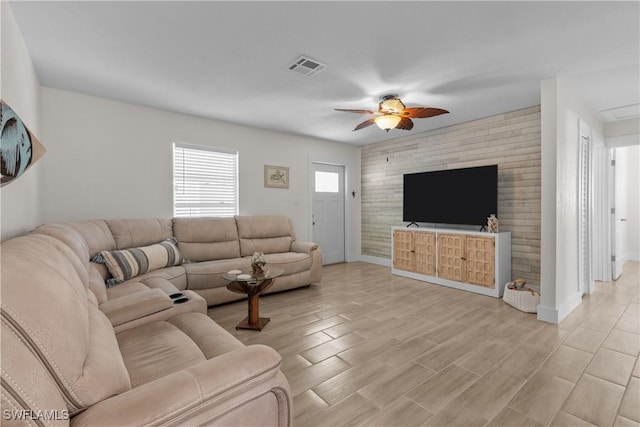 living room with ceiling fan