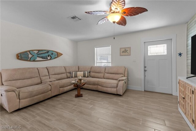 living room with ceiling fan