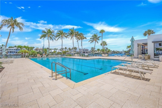 view of swimming pool featuring a patio