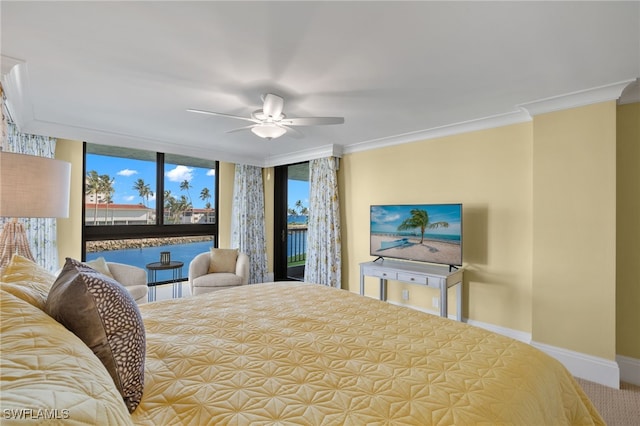 carpeted bedroom featuring ceiling fan and crown molding