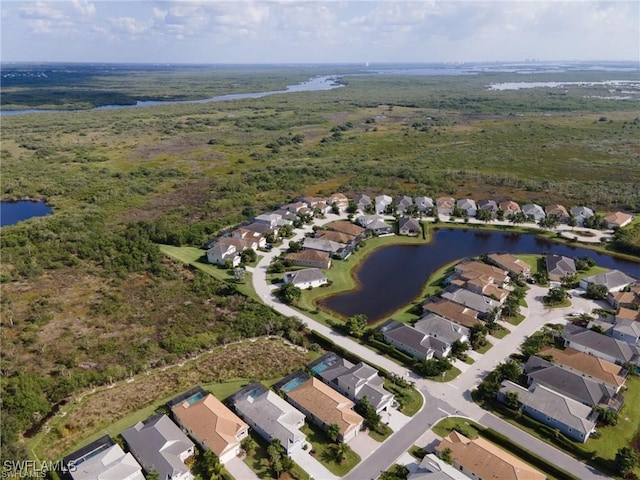 aerial view with a residential view and a water view