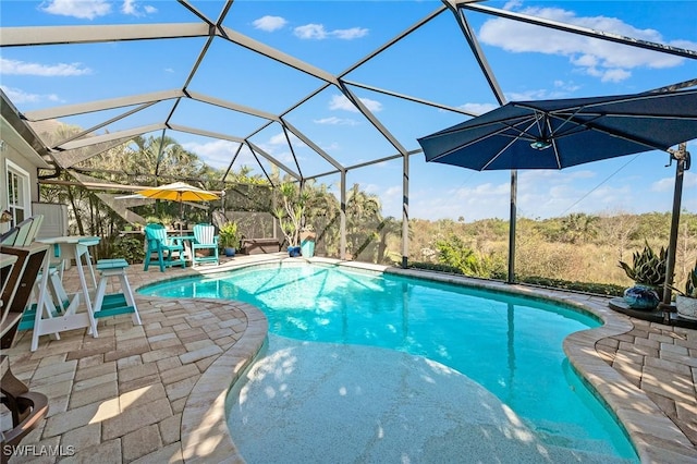 17773 Vaca Ct, Fort Myers, FL 33908 - outdoor pool with a patio area and glass enclosure