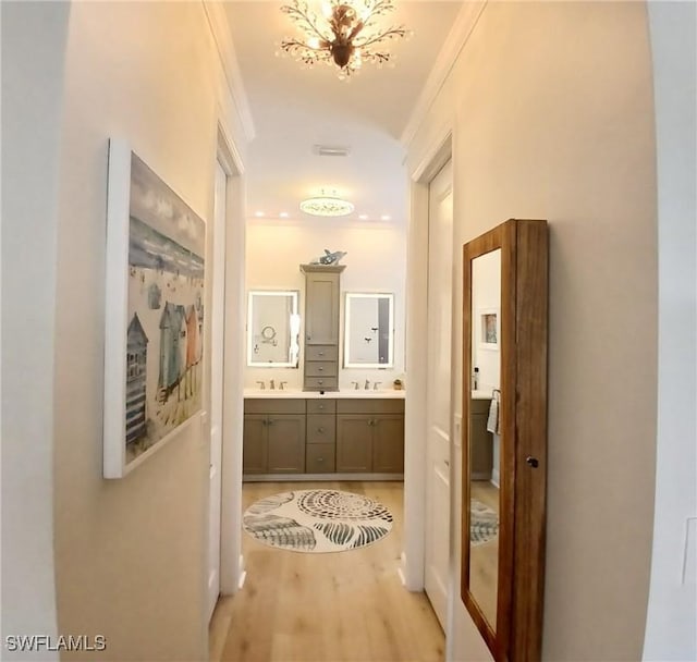17773 Vaca Ct, Fort Myers, FL 33908 - hall featuring ornamental molding and light wood-type flooring