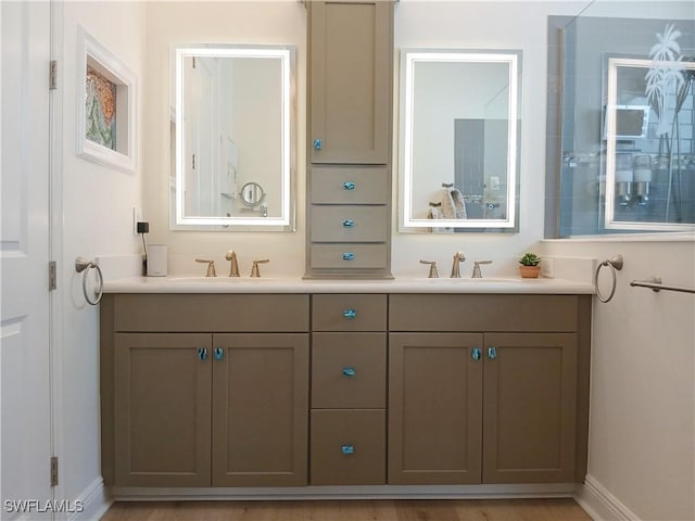 17773 Vaca Ct, Fort Myers, FL 33908 - bathroom with double vanity and baseboards