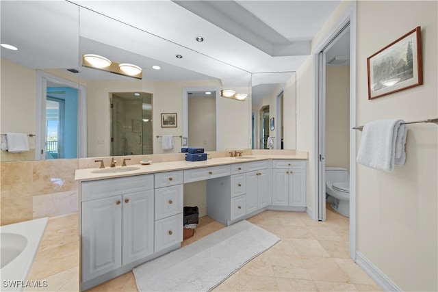 bathroom with tile patterned floors, vanity, an enclosed shower, and toilet