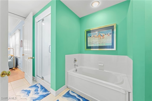 bathroom with tile patterned floors and plus walk in shower