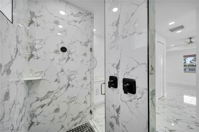 bathroom featuring ceiling fan and walk in shower