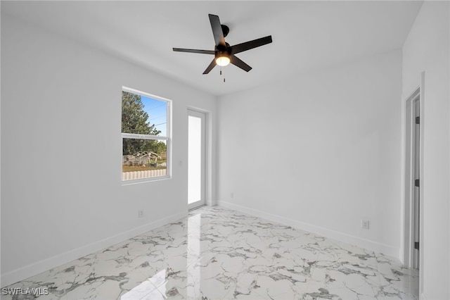 spare room featuring ceiling fan