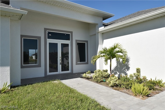 view of exterior entry with french doors