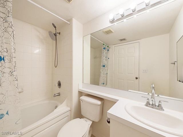 full bathroom featuring shower / bath combo, vanity, and toilet