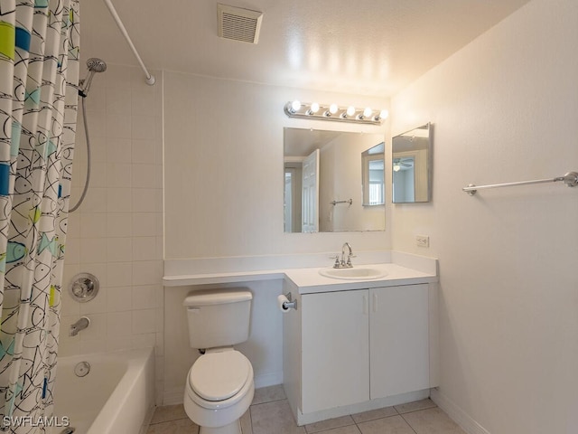 full bathroom featuring tile patterned flooring, shower / bath combination with curtain, toilet, and vanity