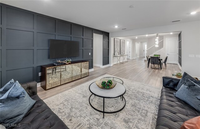 living room featuring light wood-type flooring