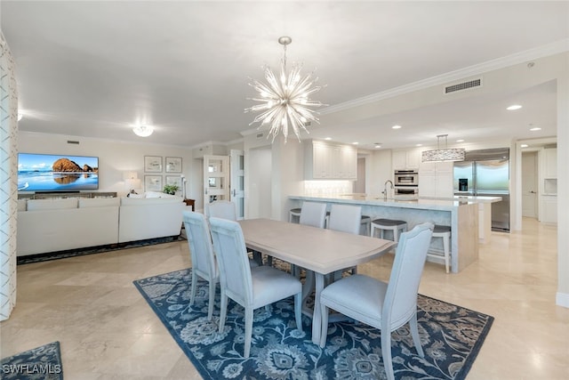 dining area with a chandelier and ornamental molding