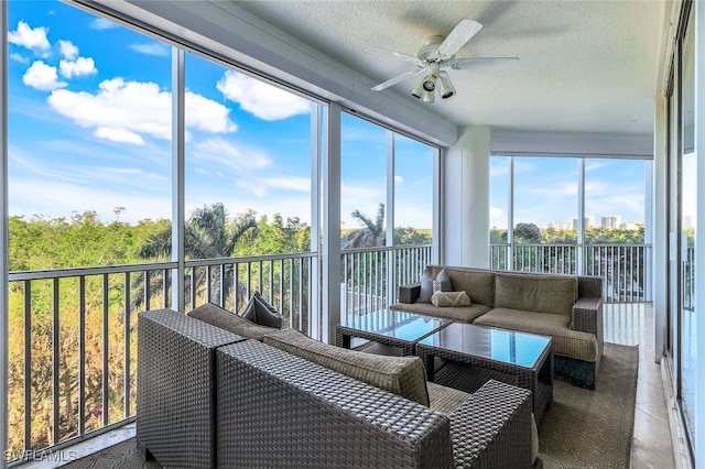 sunroom / solarium with ceiling fan