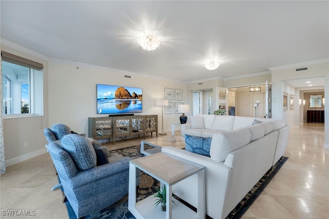 living room featuring crown molding