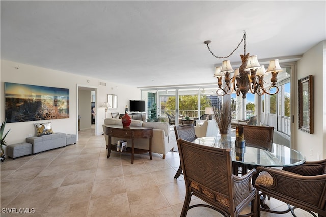 tiled dining room with a notable chandelier