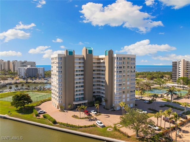 view of building exterior with a water view