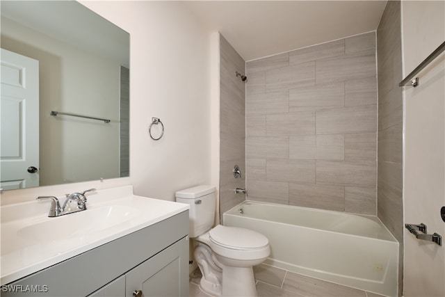 full bathroom featuring vanity, toilet, and tiled shower / bath