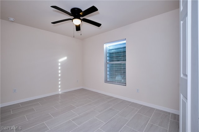 unfurnished room featuring ceiling fan