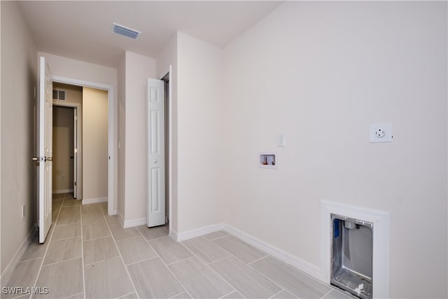 laundry area with electric dryer hookup and hookup for a washing machine