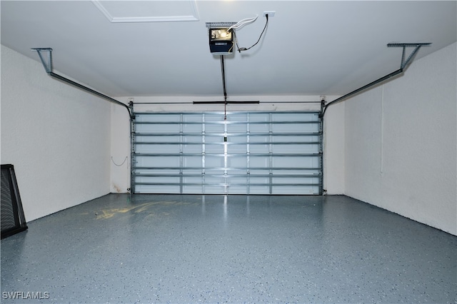 garage featuring a garage door opener