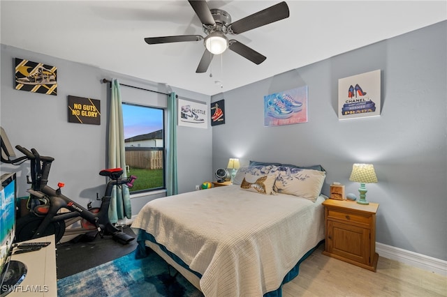 bedroom featuring ceiling fan and light wood-type flooring