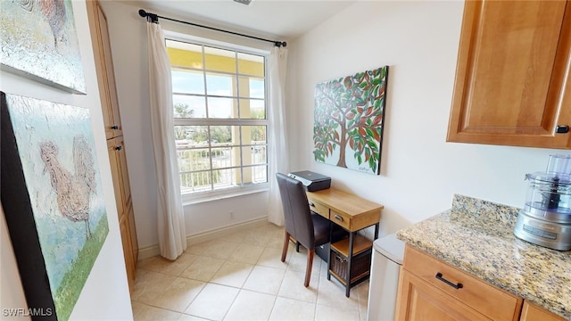 tiled dining space with plenty of natural light